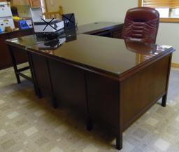 custom built mahogany desk and credenza. Leather office chair