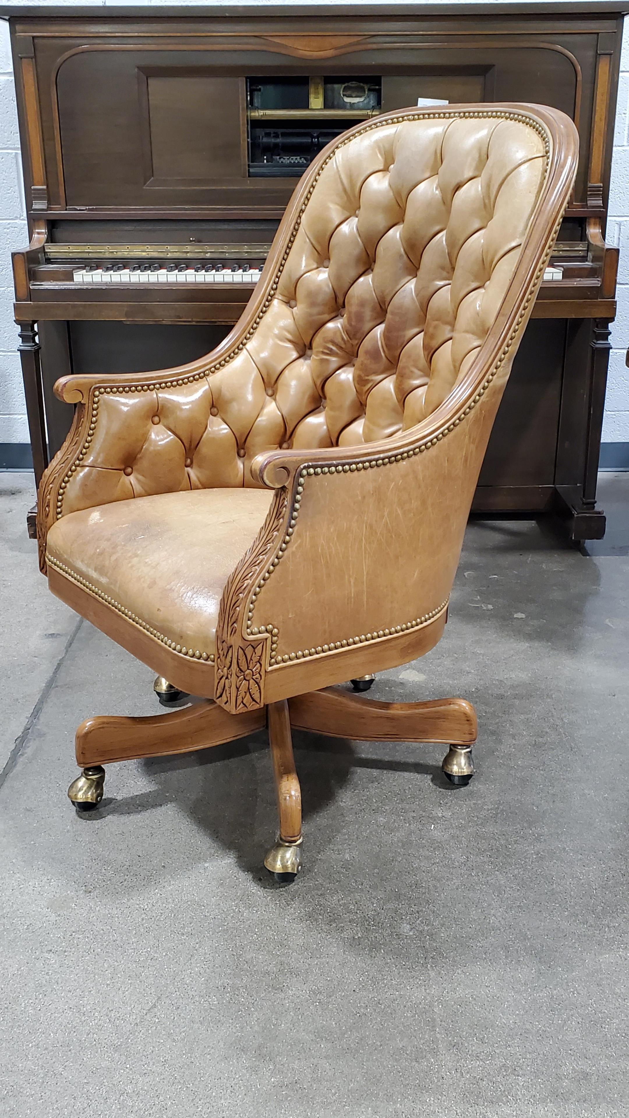 Button Tufted Rustic Leather Swivel Arm Chair